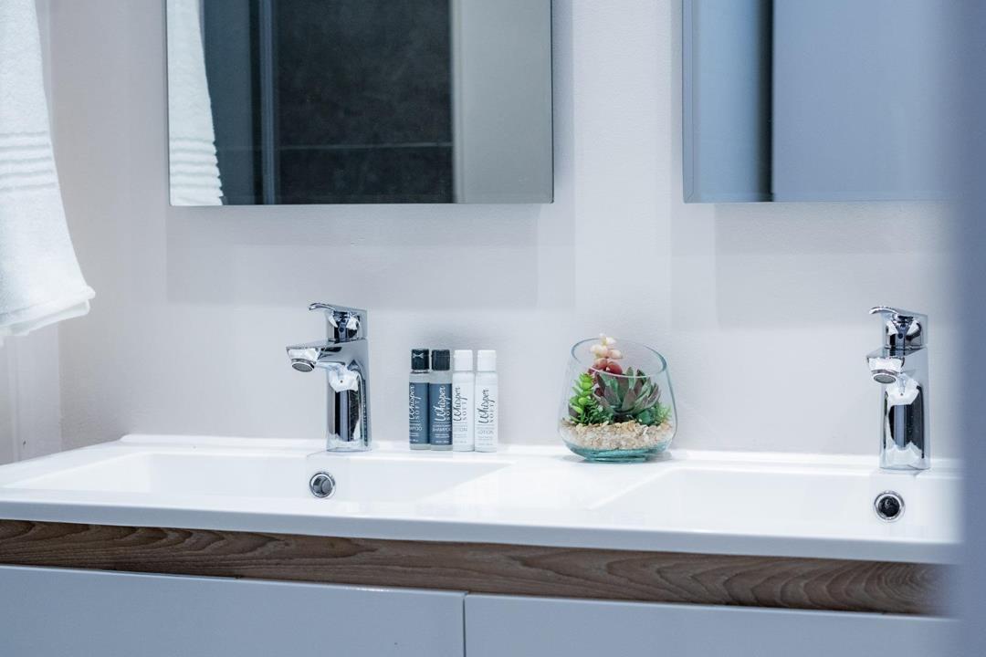Double vanity in the bathroom at Unit 125